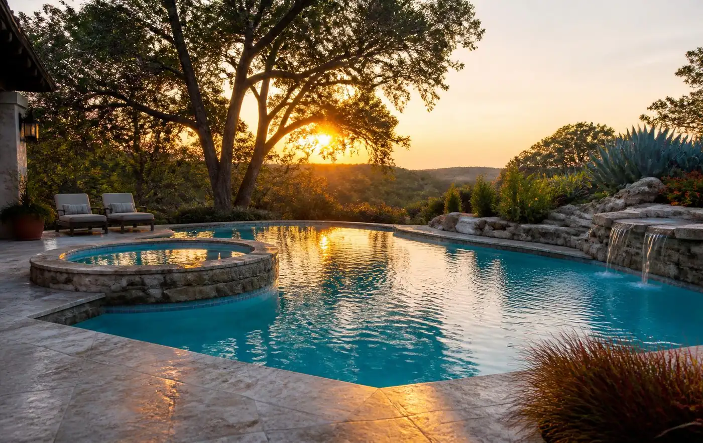 Clean backyard swimming pool in the Texas Hill Country at sunset